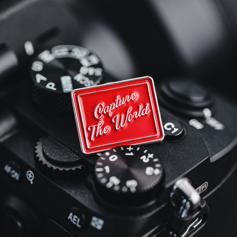 Épinglette "Capture the World"